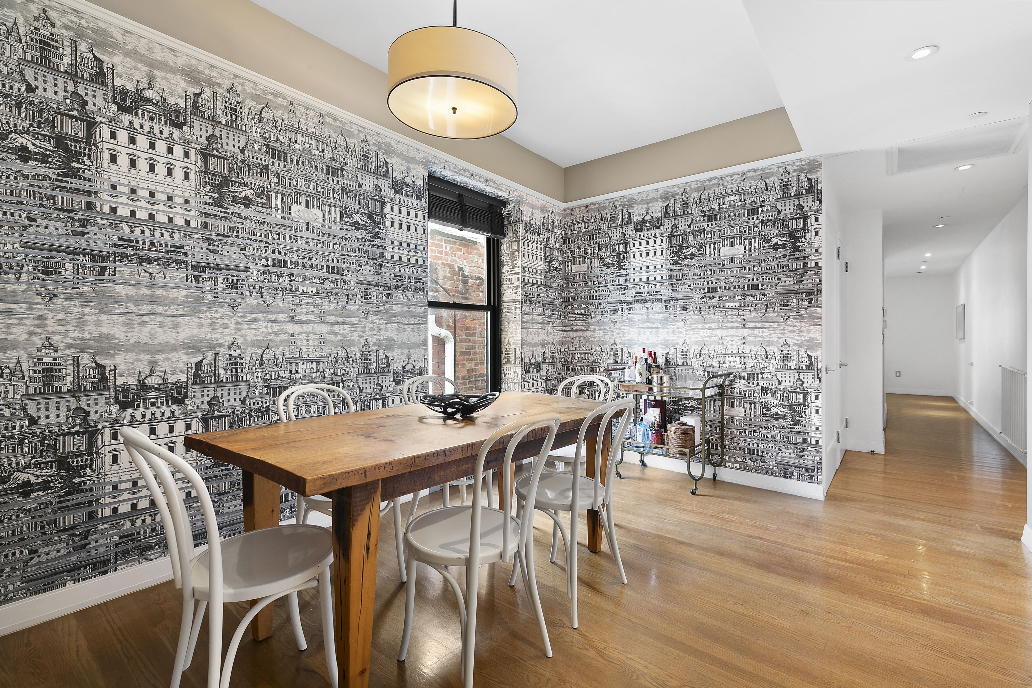 422 West 20th Street, Unit 5A Manhattan, NY 10011 - Photo 6 of 14 a view of a dining room with furniture and wooden floor