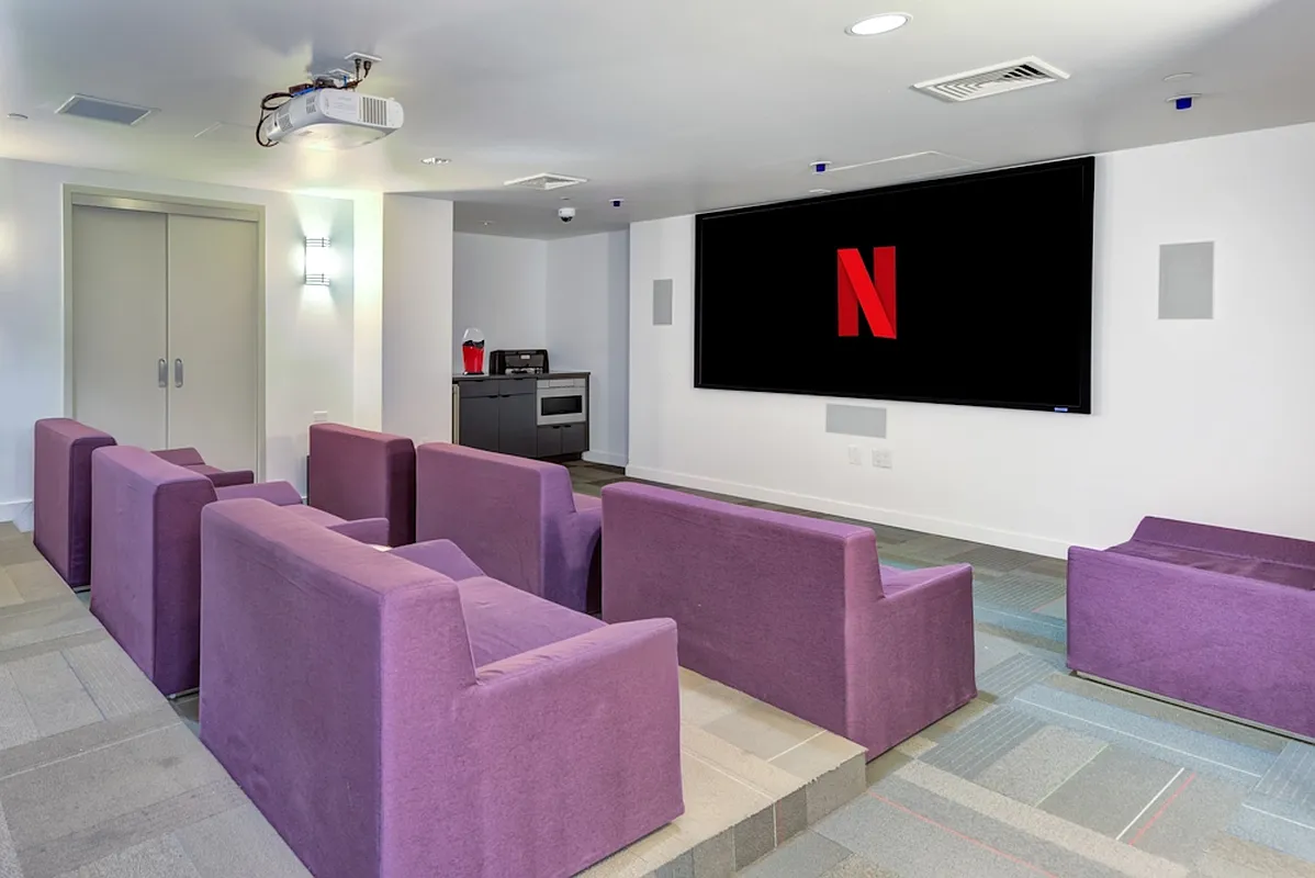 626 Flatbush Avenue, Unit 7E Brooklyn, NY 11225 - Photo 11 of 23 a living room with furniture and a flat screen tv