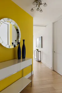 a view of a living room and bathroom