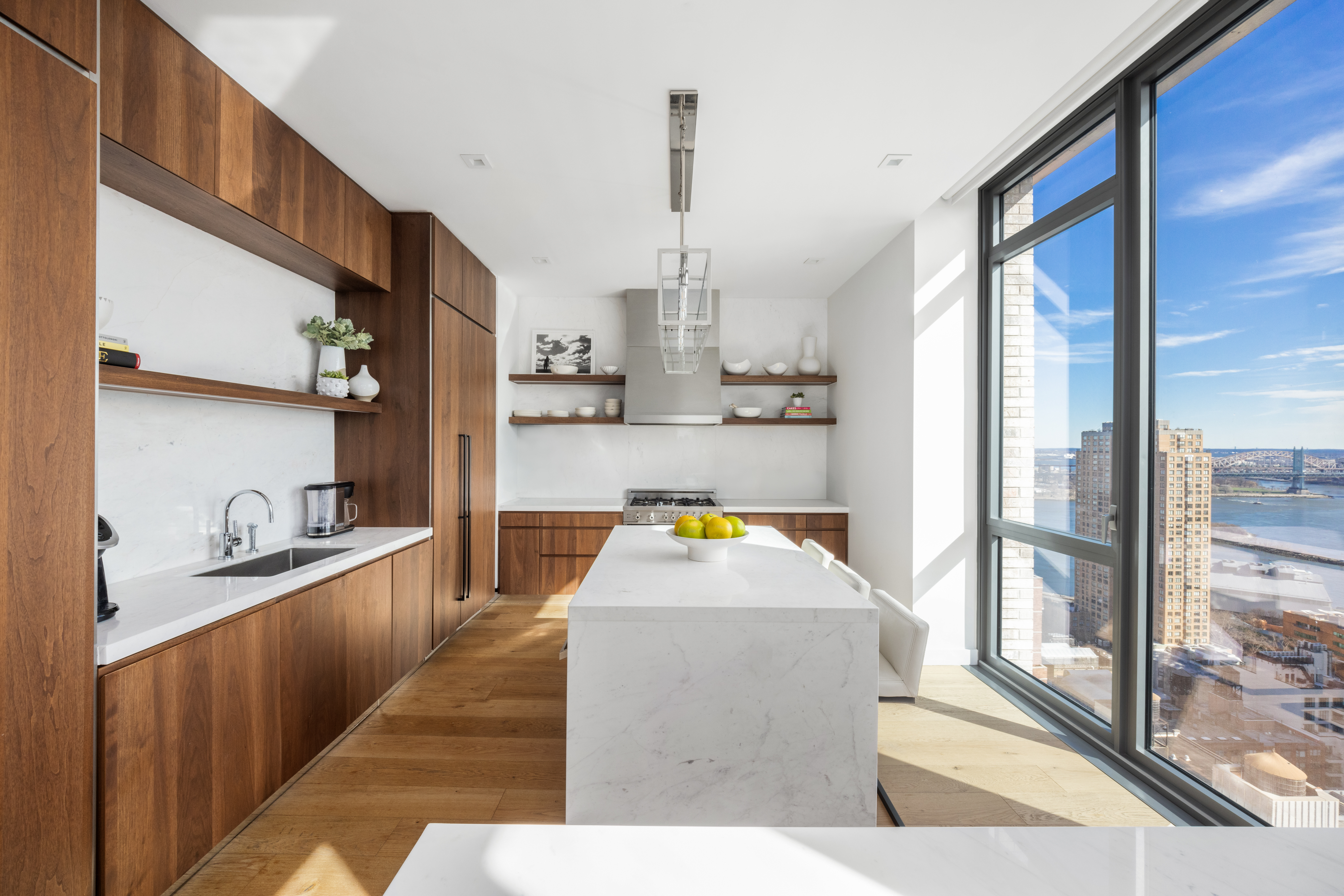 360 East 89th Street, Unit 29B Manhattan, NY 10128 - Photo 6 of 22 a kitchen with counter top space and a sink