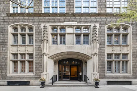 a front view of a building with a entrance