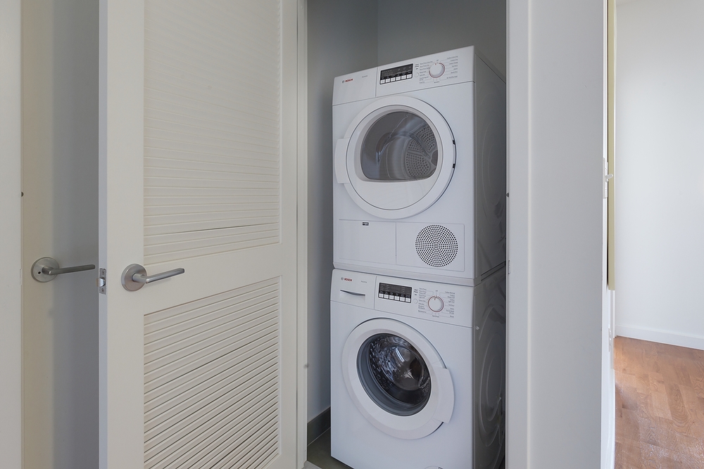 22 Caton Place, Unit 4H Brooklyn, NY 11218 - Photo 8 of 20 a utility room with dryer and washer