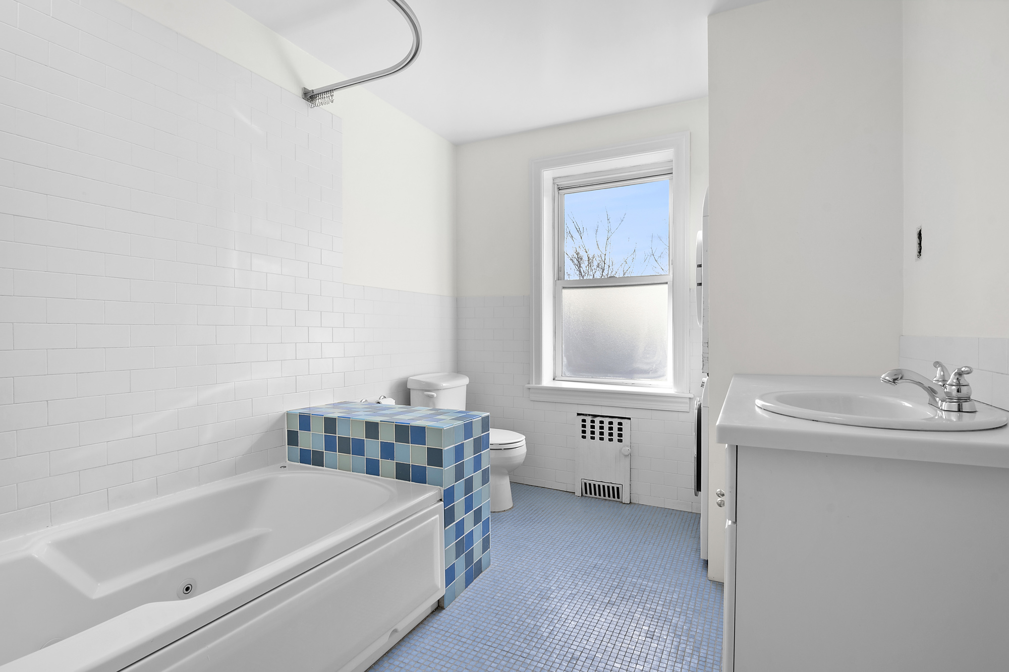188 Warren Street, Unit TRIPLEX Brooklyn, NY 11201 - Photo 11 of 15 a bathroom with a sink and a bathtub