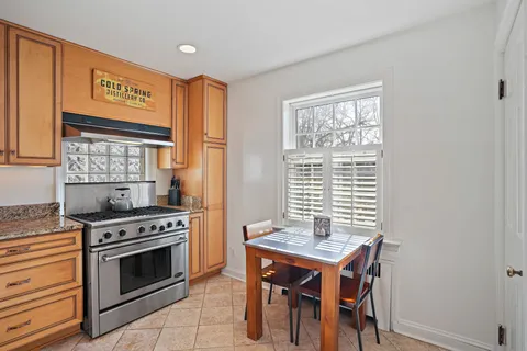 a bathroom with a sink and a white vanity