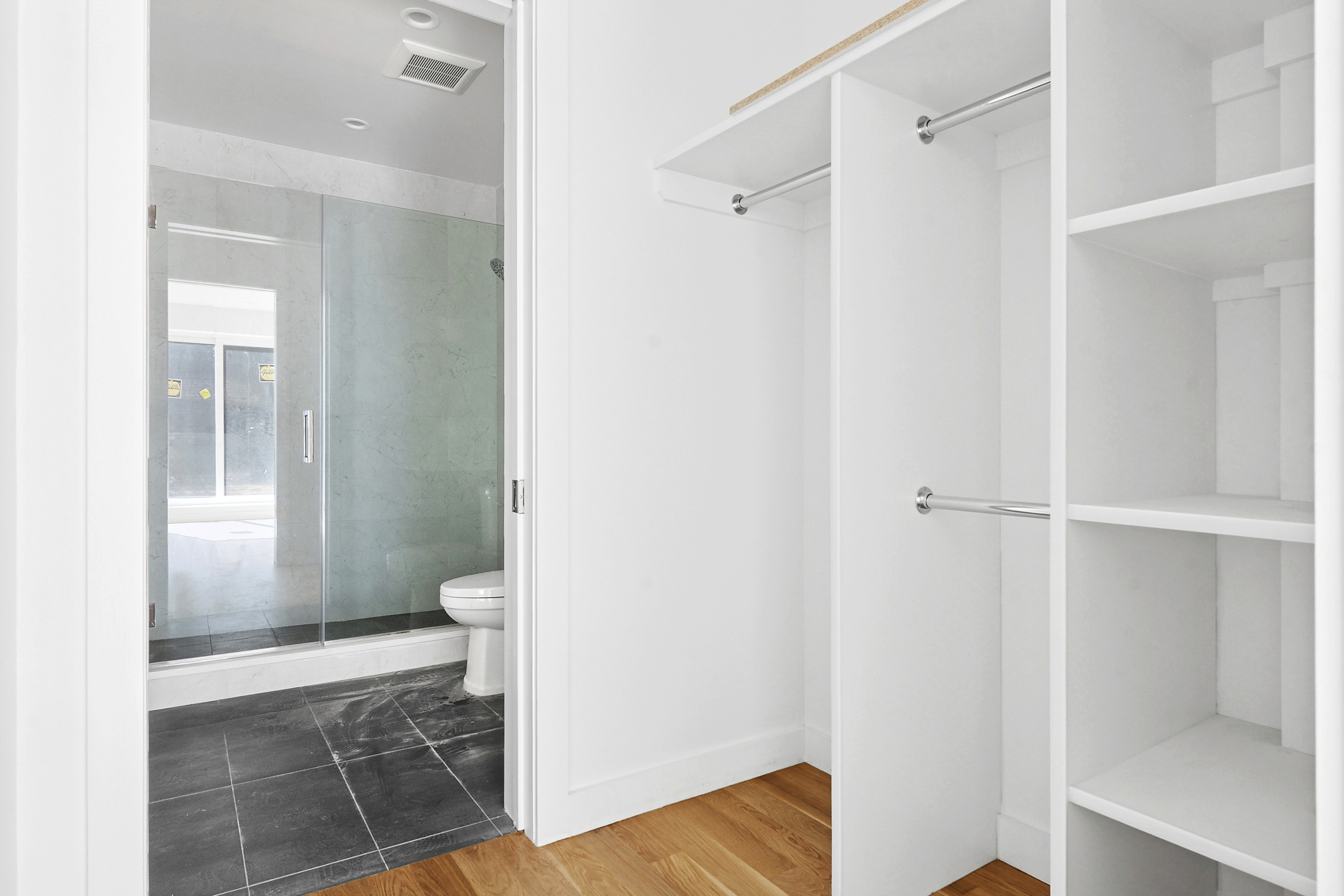 212 Montrose Avenue, Unit 4R Brooklyn, NY 11206 - Photo 6 of 12 a bathroom with a shower and toilet