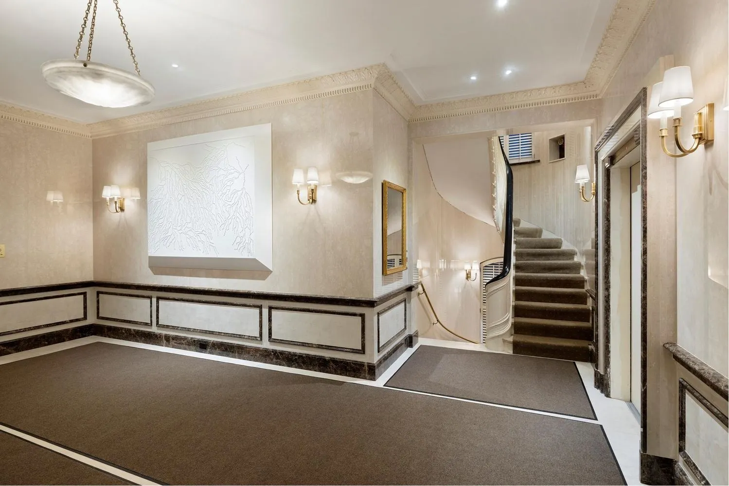 a view of a hallway with seating area