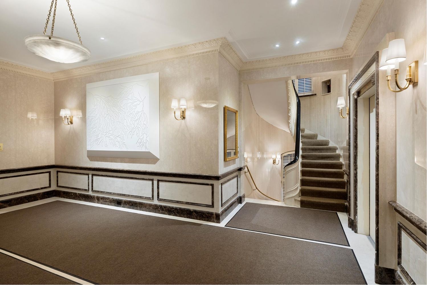 521 Park Avenue, Unit 10A Manhattan, NY 10065 - Photo 7 of 11 a view of a hallway with seating area