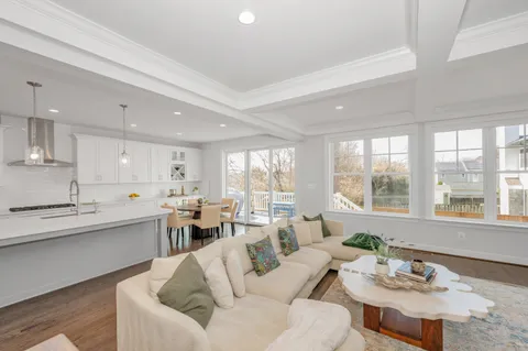 a kitchen with a stove and a sink