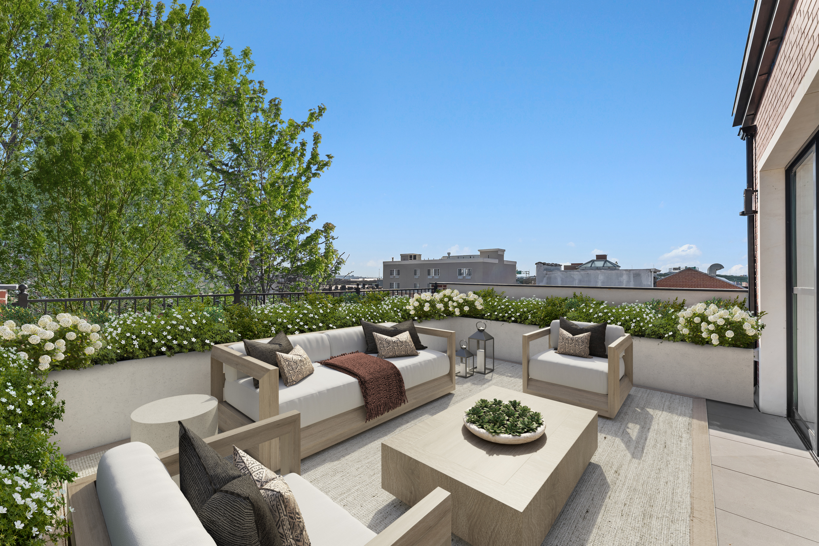 167 13th Street, Unit PH Brooklyn, NY 11215 - Photo 9 of 14 a view of a patio with couches potted plants and a table