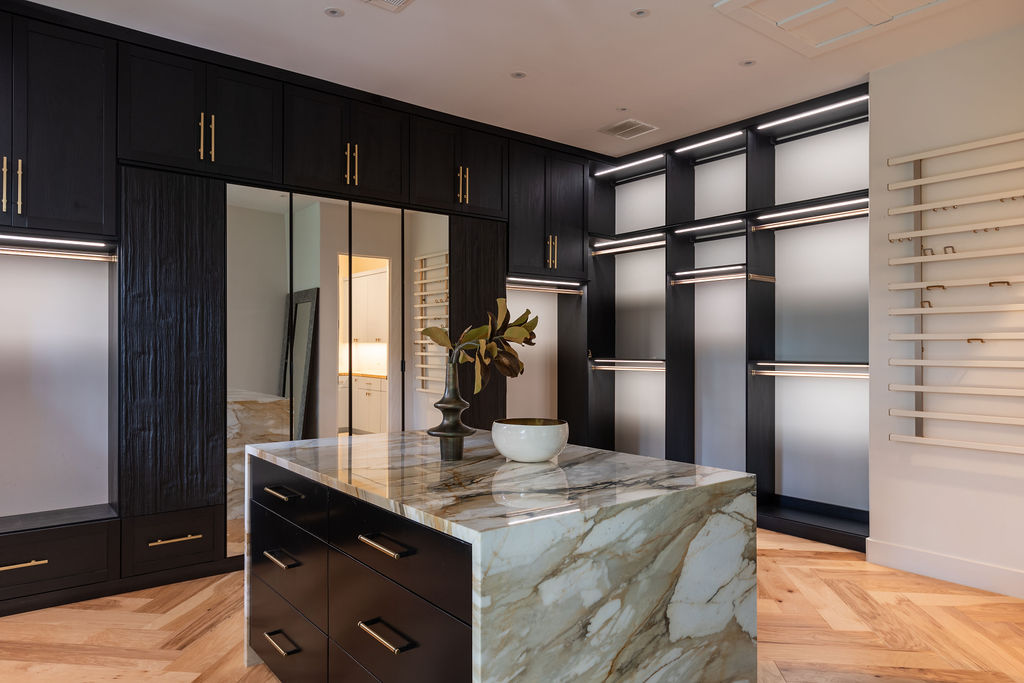 400 Inwood Road Austin, TX 78746 - Photo 33 of 43 a kitchen with kitchen island a counter top space cabinets and stainless steel appliances