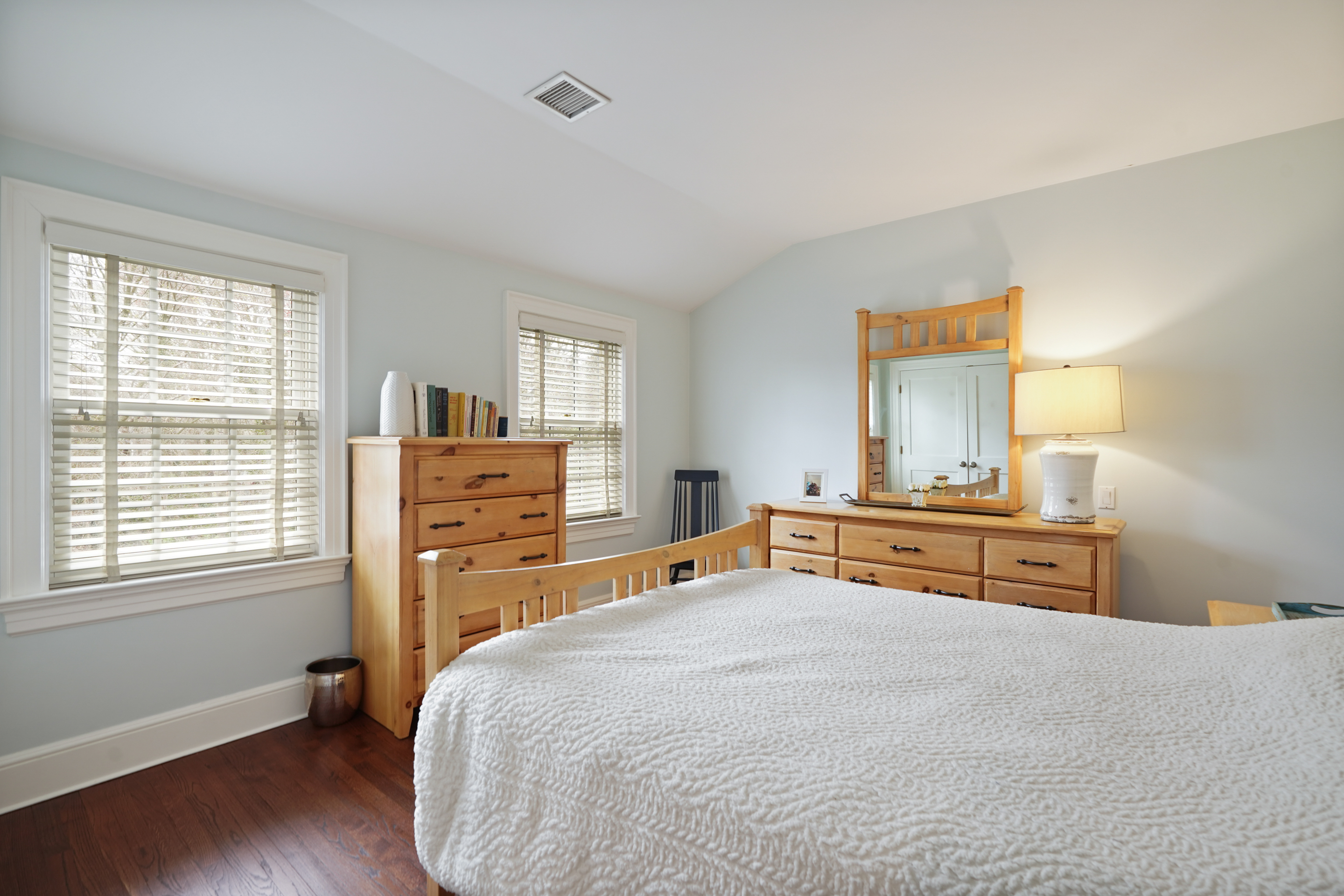 15 Anderson Road Greenwich, CT 06830 - Photo 19 of 30 a bedroom with a bed and wooden floor