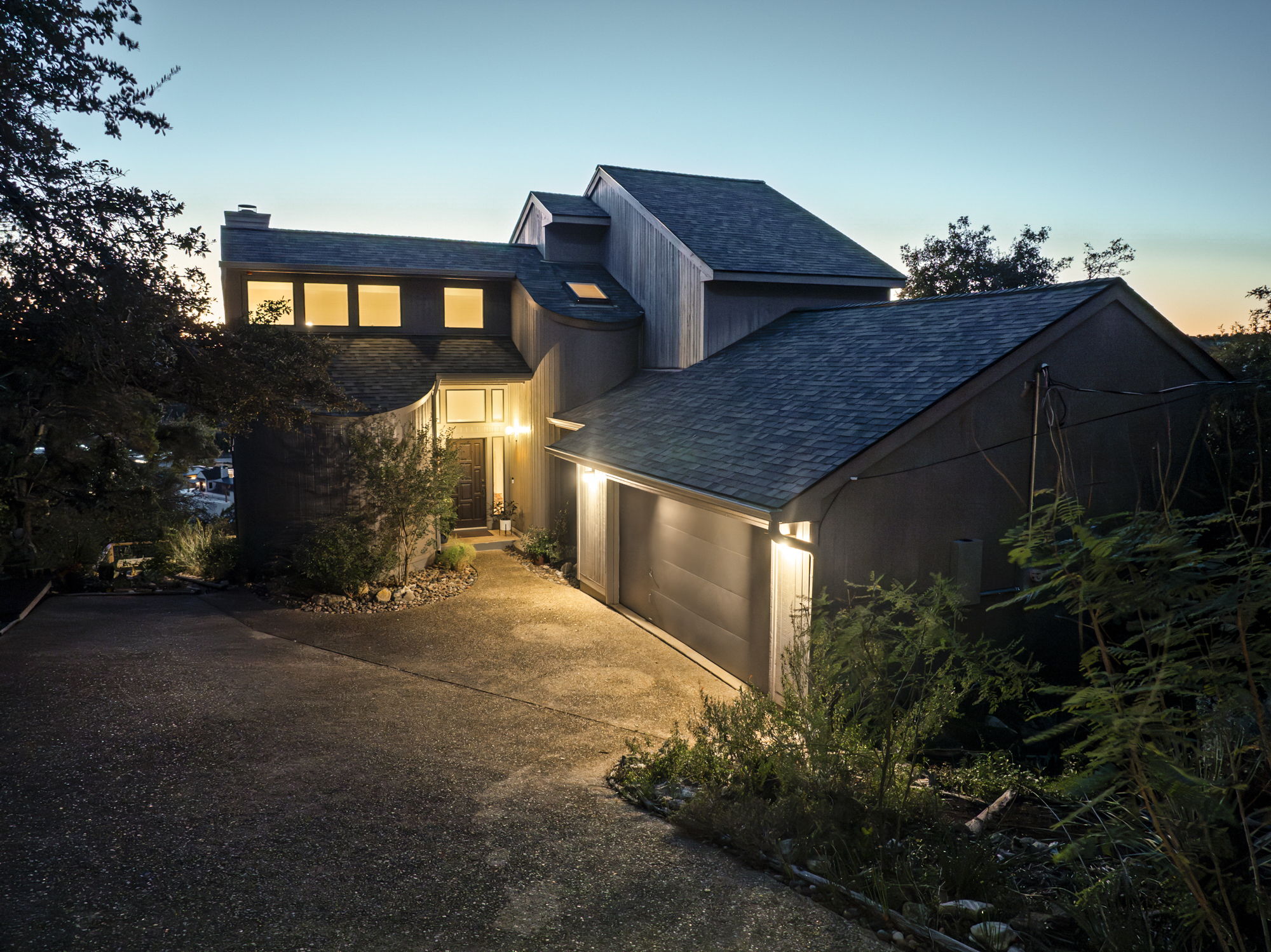 1605 The High Road Austin, TX 78746 - Photo 43 of 45 a backyard of a house with lots of green space