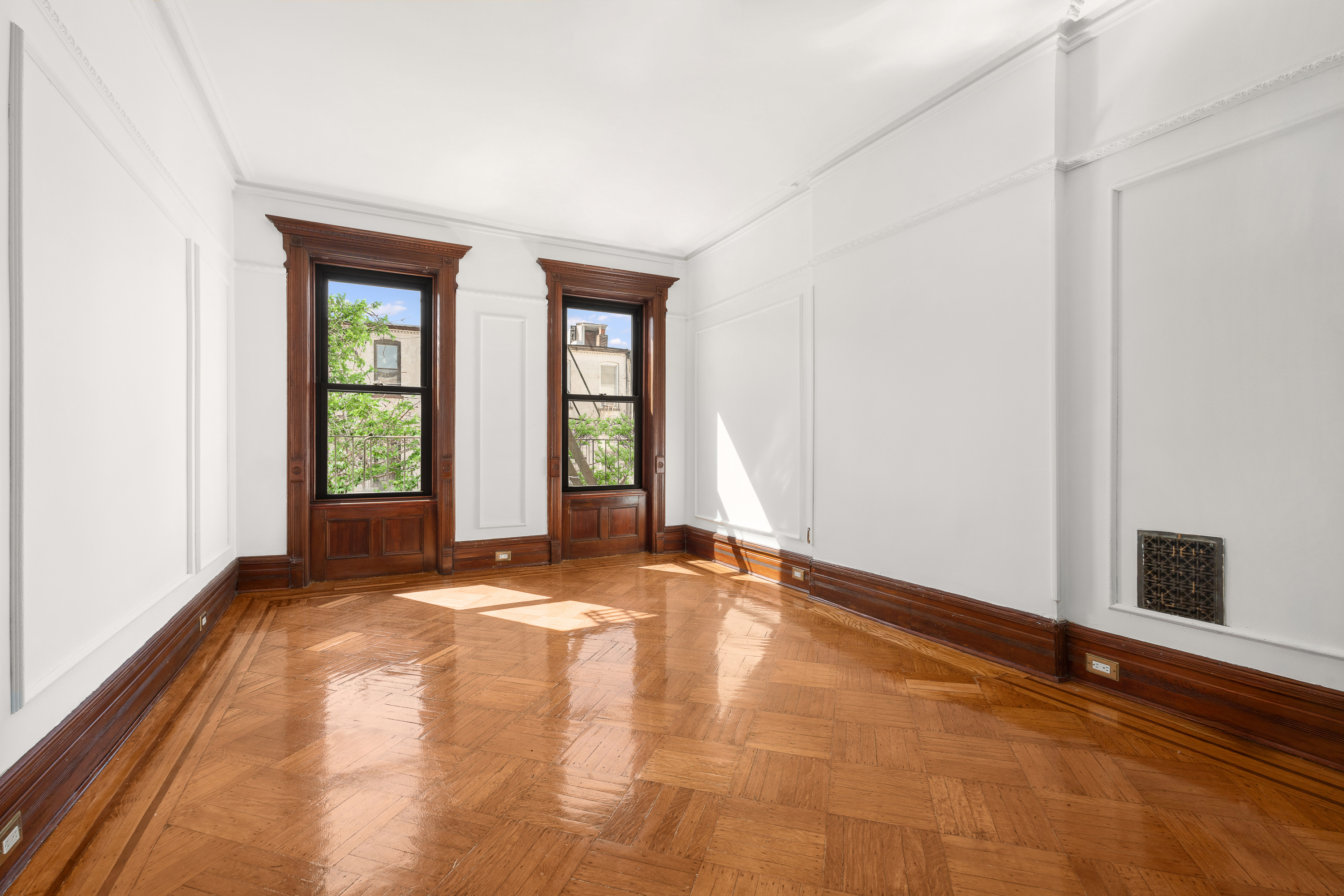 420 8th Street Brooklyn, NY 11215 - Photo 13 of 20 a view of an empty room with window and hardwood floor