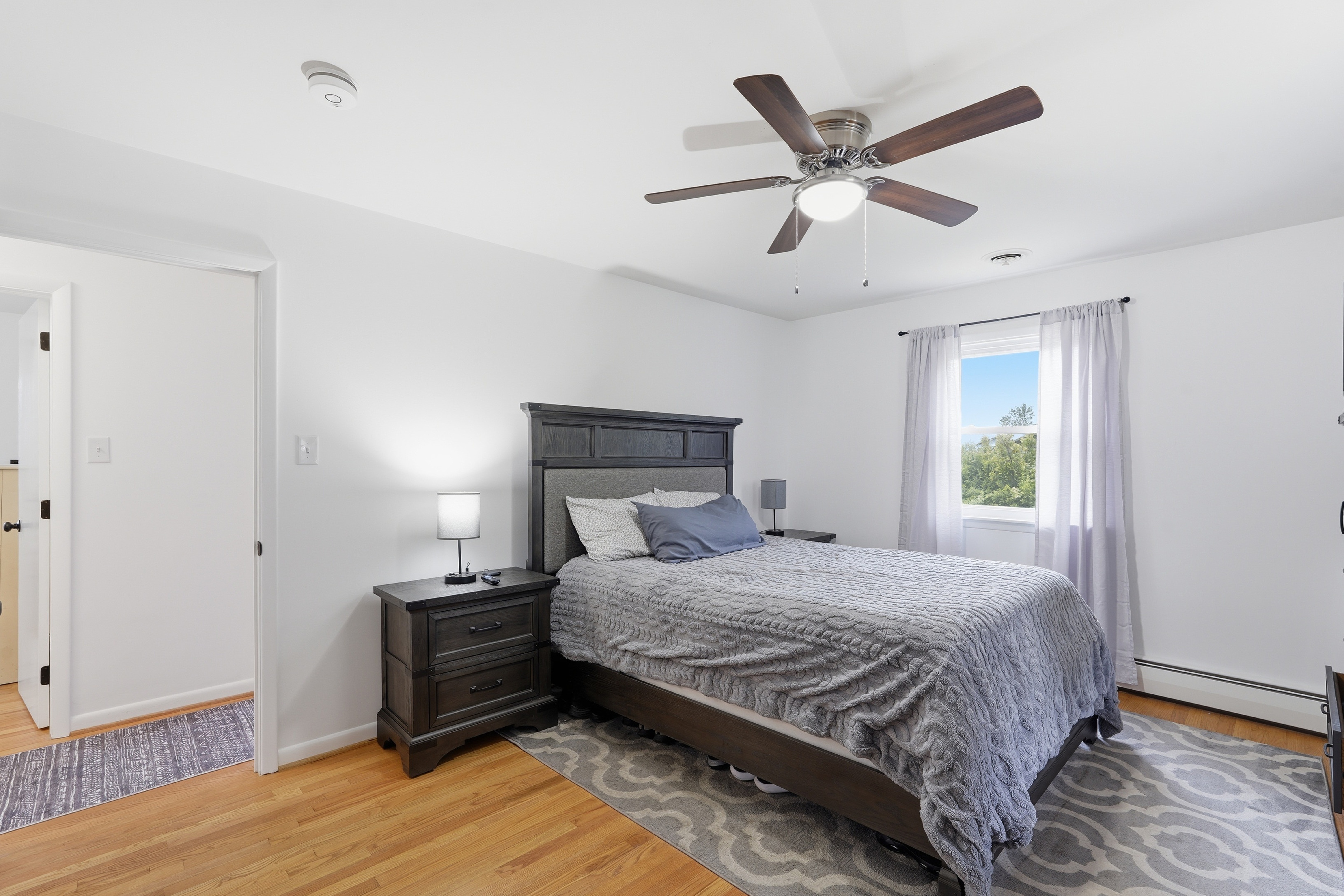 7717 McKaig Road Frederick, MD 21701 - Photo 20 of 53 a bedroom with a bed and a ceiling fan