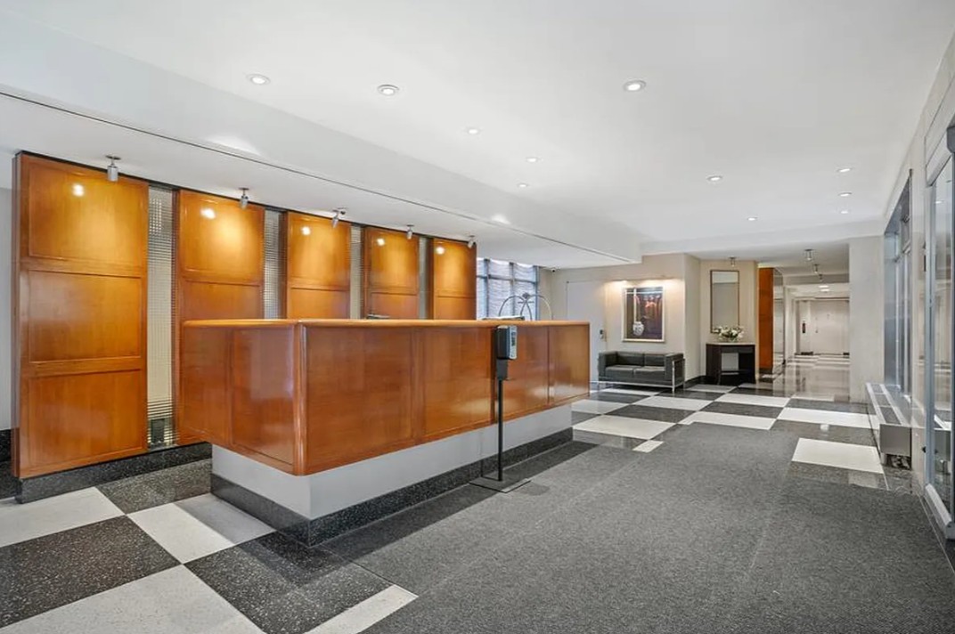 2 Tudor City Place, Unit 11KN Manhattan, NY 10017 - Photo 12 of 14 a view of a big room with windows