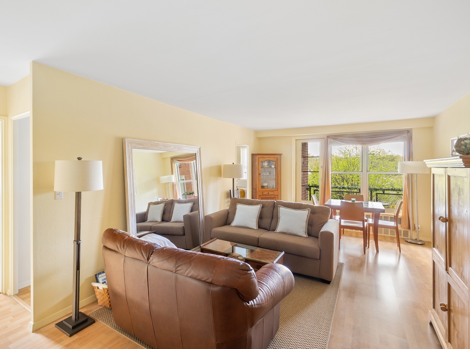 35-11 85th Street, Unit 5H Queens, NY 11372 - Photo 3 of 11 a living room with furniture and a large window