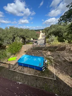 a view of a yard with an outdoor space