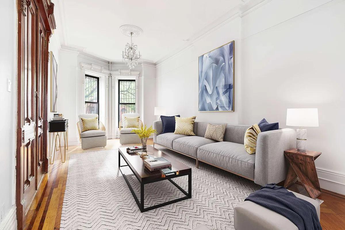 831 President Street Brooklyn, NY 11215 - Photo 1 of 9 a living room with furniture and a chandelier
