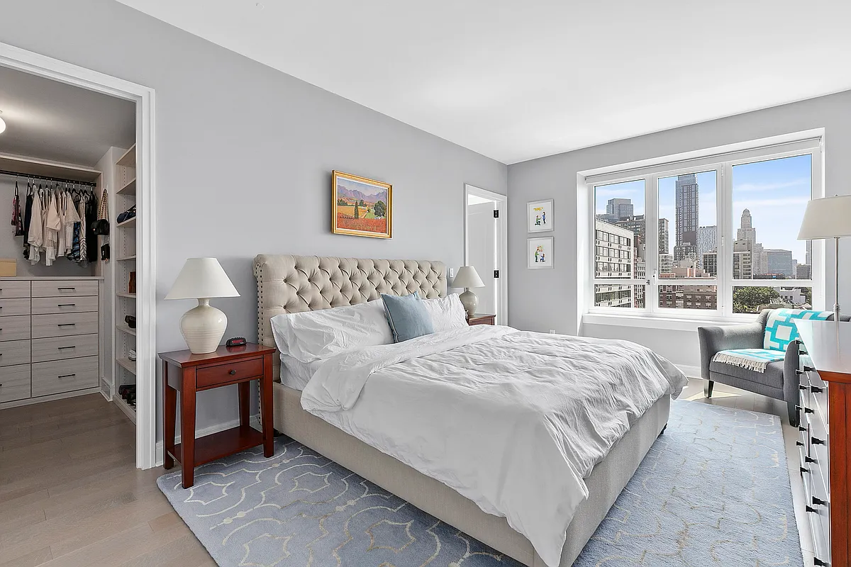 265 State Street, Unit 901 Brooklyn, NY 11201 - Photo 4 of 10 a bedroom with a bed and a window