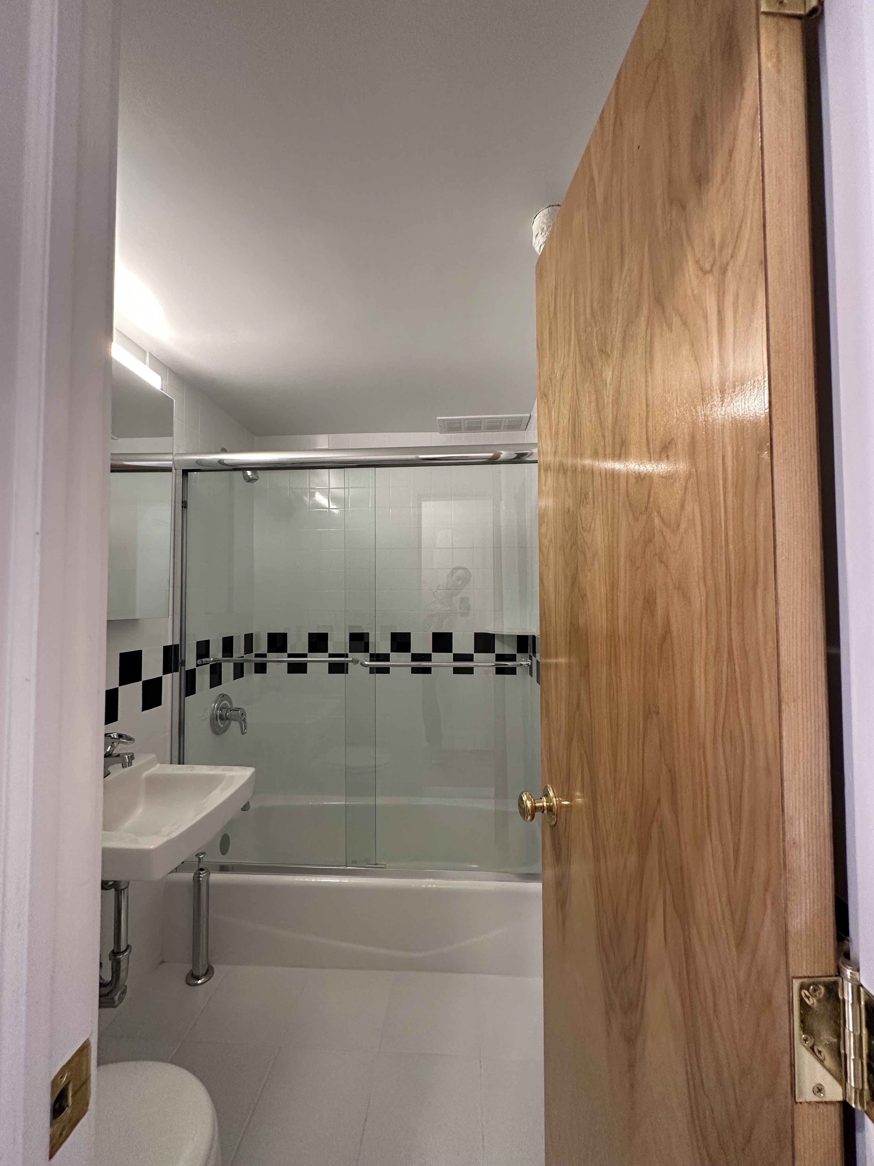 752 Greenwich Street, Unit 1A/B Manhattan, NY 10014 - Photo 10 of 12 a bathroom with a bathtub and a shower