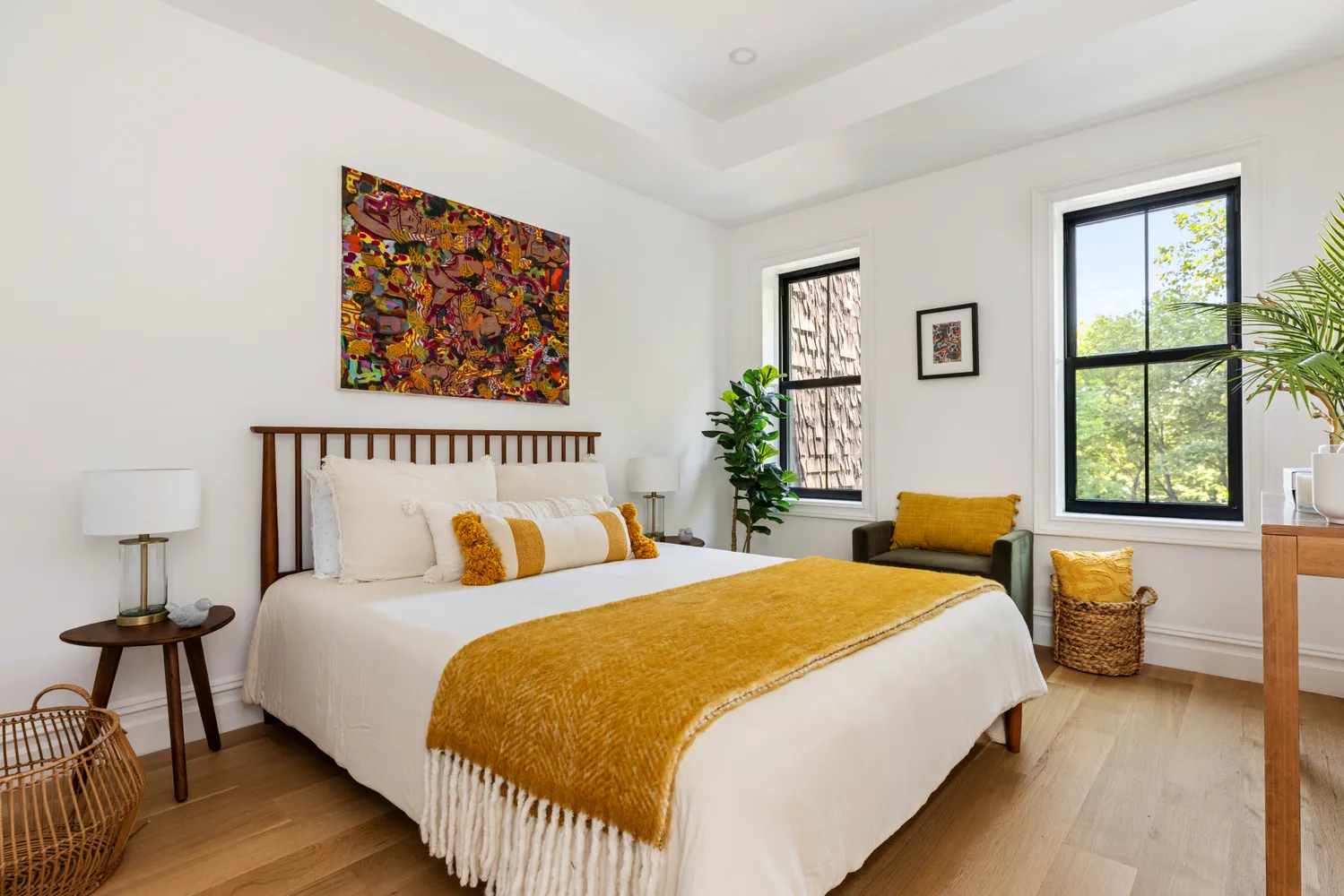 a bedroom with bed and a window