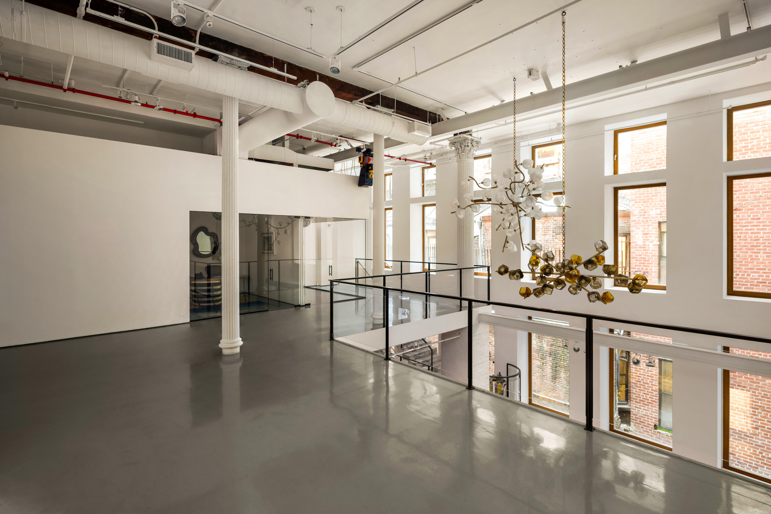 64 White Street, Unit RETAIL Manhattan, NY 10013 - Photo 15 of 31 a view of a living room with a large window