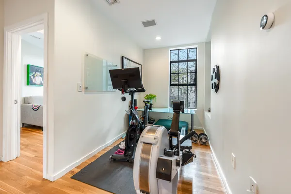 a room with furniture and a flat screen tv