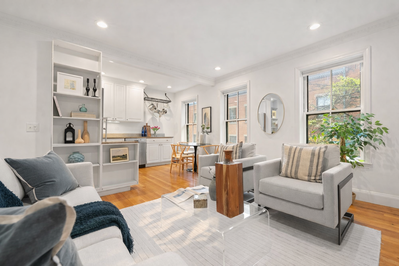 63 West Cedar Street, Unit 3 Boston, MA 02114 - Photo 4 of 17 a living room with furniture and a large window