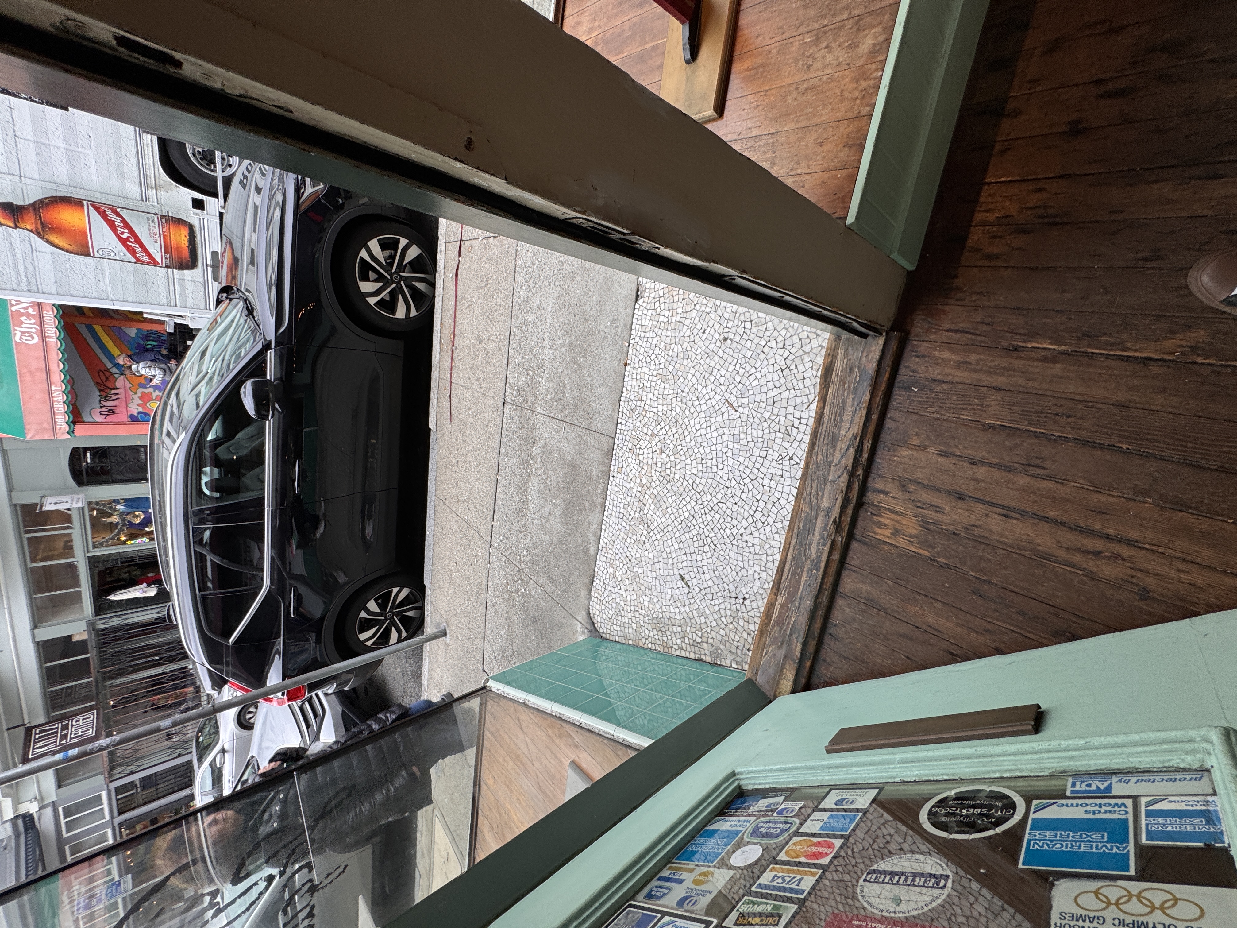 1454 Grant Avenue San Francisco, CA 94133 - Photo 12 of 34 a car parked in front of a building