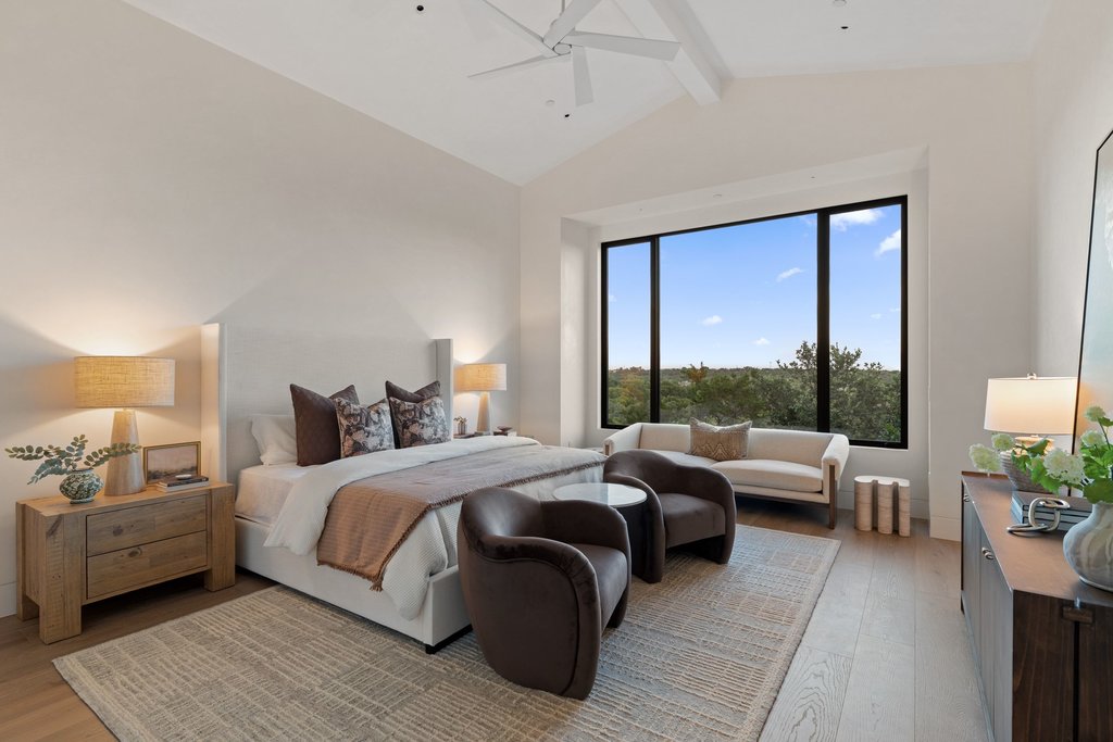 Mt Bonnell Road Austin, TX 78731 - Photo 27 of 51 a bedroom with a bed and a couch