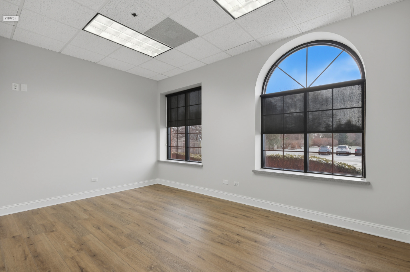 6475 Washington Street Gurnee, IL 60031 - Photo 8 of 45 an empty room with wooden floor and windows