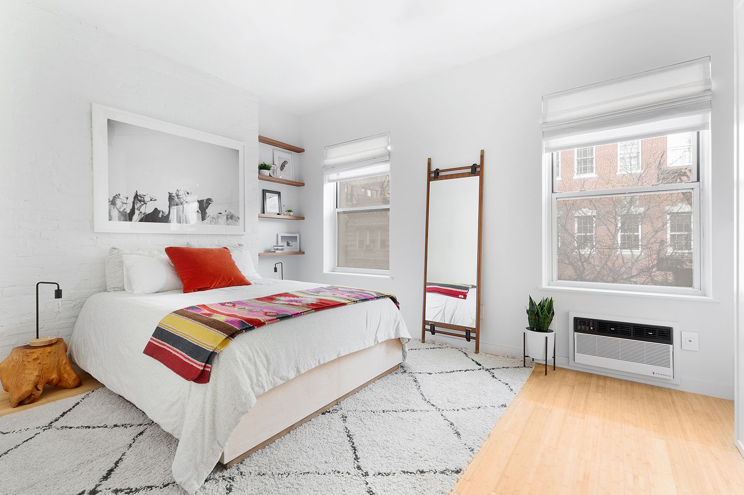 258 West 93rd Street, Unit 4AB Manhattan, NY 10025 - Photo 6 of 10 a bedroom with a bed and a cabinets