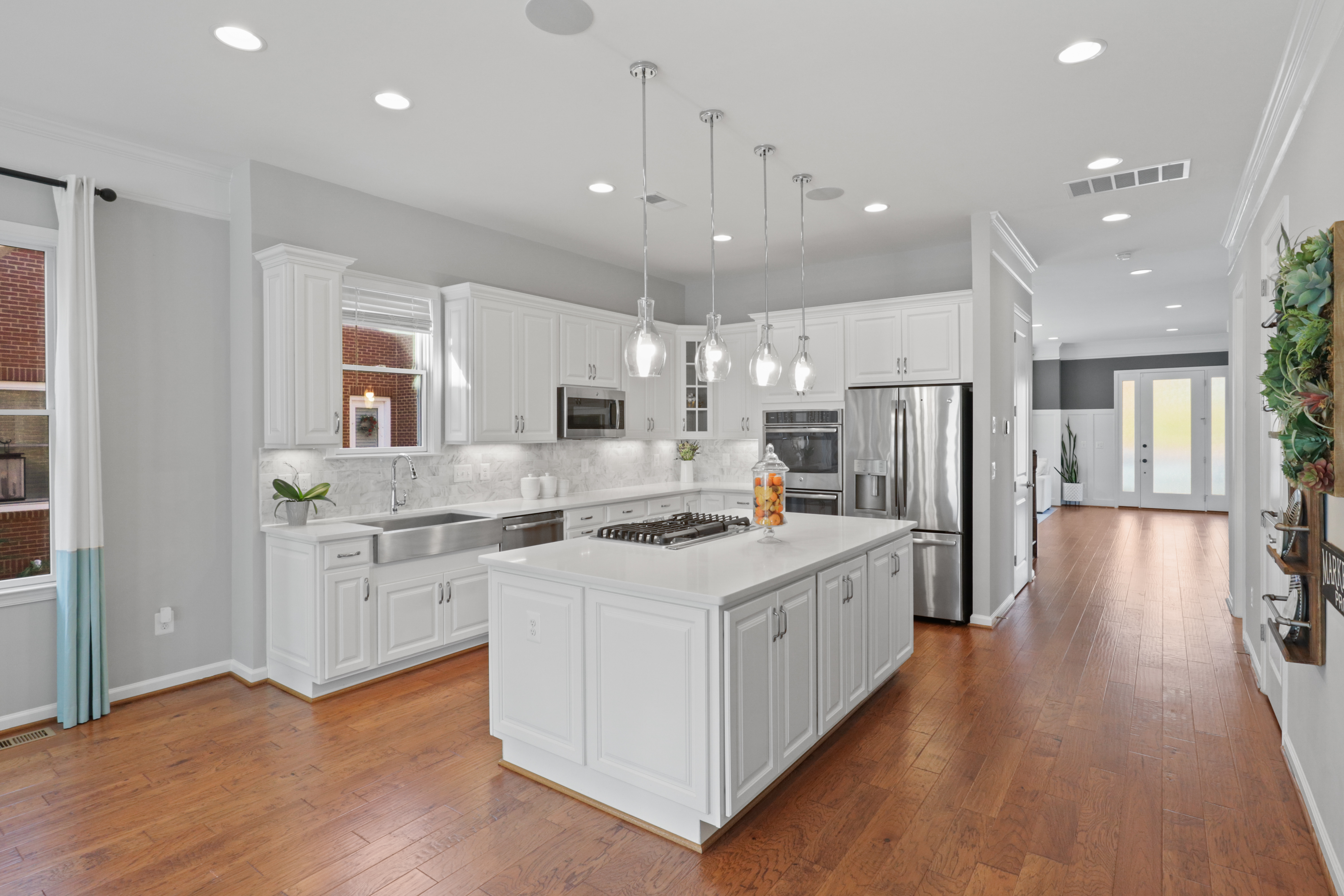 9101 Power House Road Lorton, VA 22079 - Photo 17 of 75 a kitchen with stainless steel appliances granite countertop a lot of counter space and wooden floors