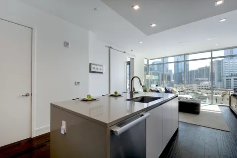 a tall building sitting on the side of a street