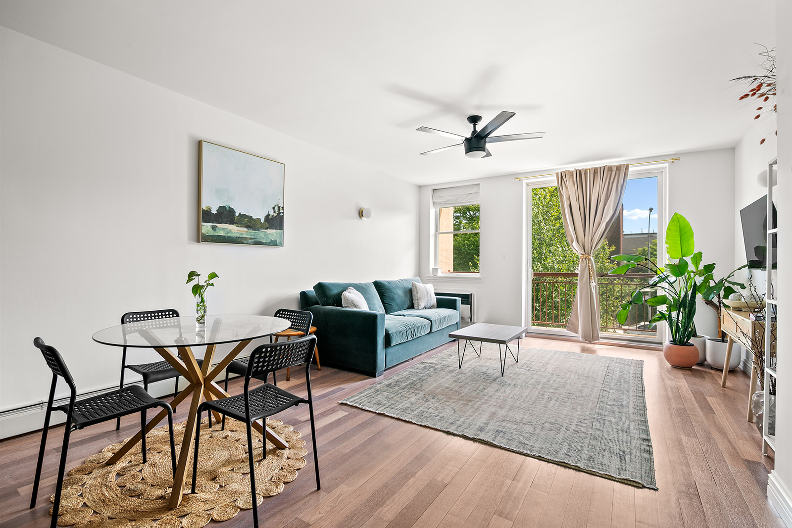 127 4th Place, Unit 2A Brooklyn, NY 11231 - Photo 1 of 6 a view of a livingroom with furniture and a potted plant