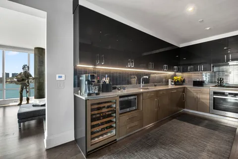 a kitchen with a sink and counter top space