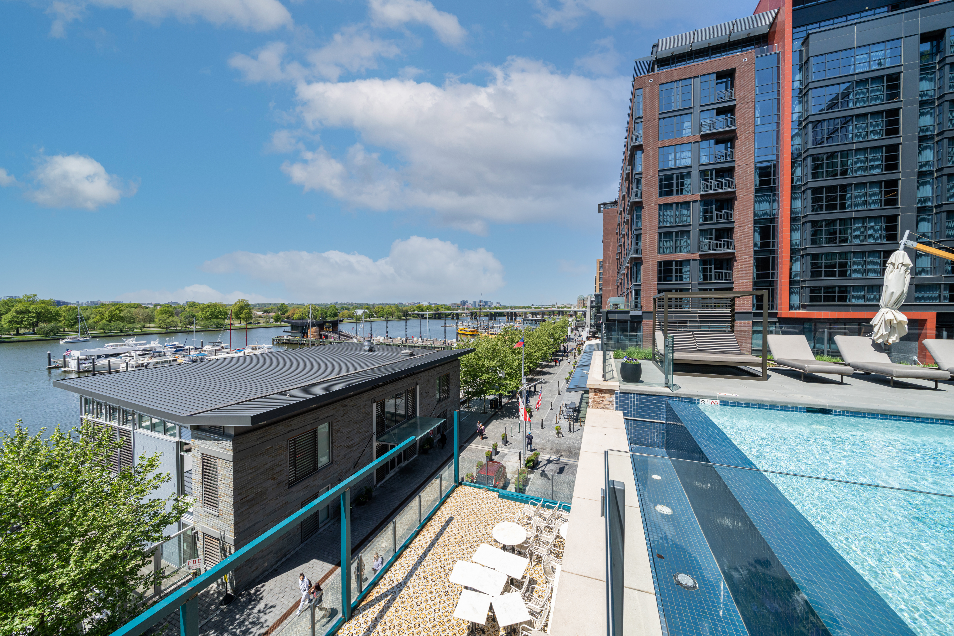45 Sutton Square Southwest, Unit PH10 Washington, DC 20024 - Photo 33 of 44 a view of tall buildings from a balcony