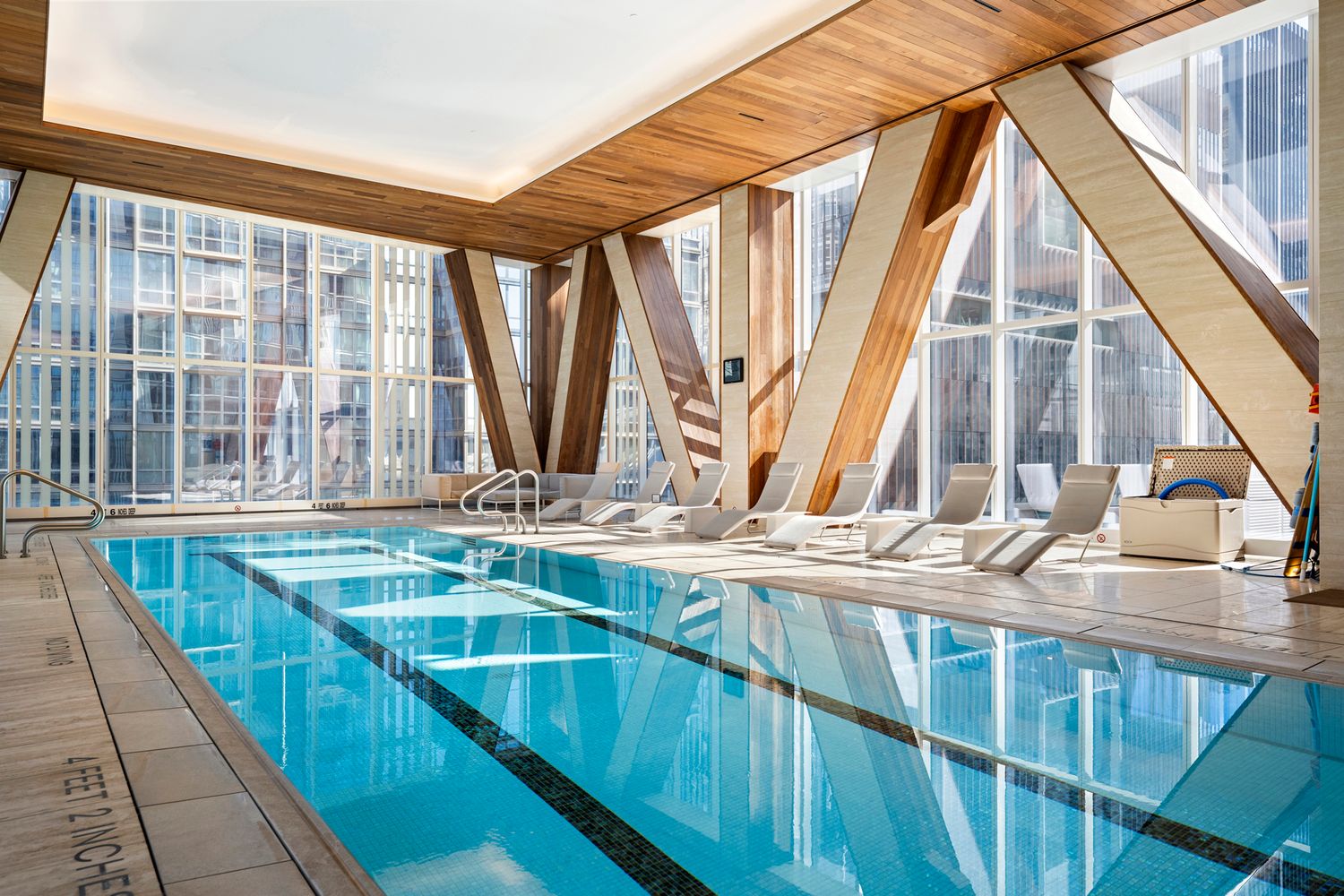 a view of a kitchen with a large window and furniture