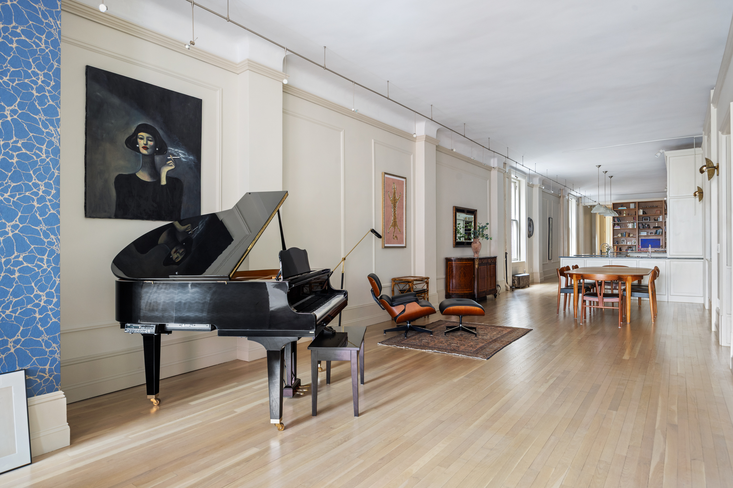 714 Broadway, Unit 8 Manhattan, NY 10003 - Photo 13 of 23 a living room with furniture and wooden floor