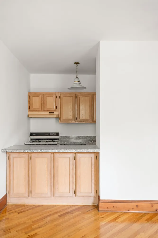 a bathroom with a sink and a window