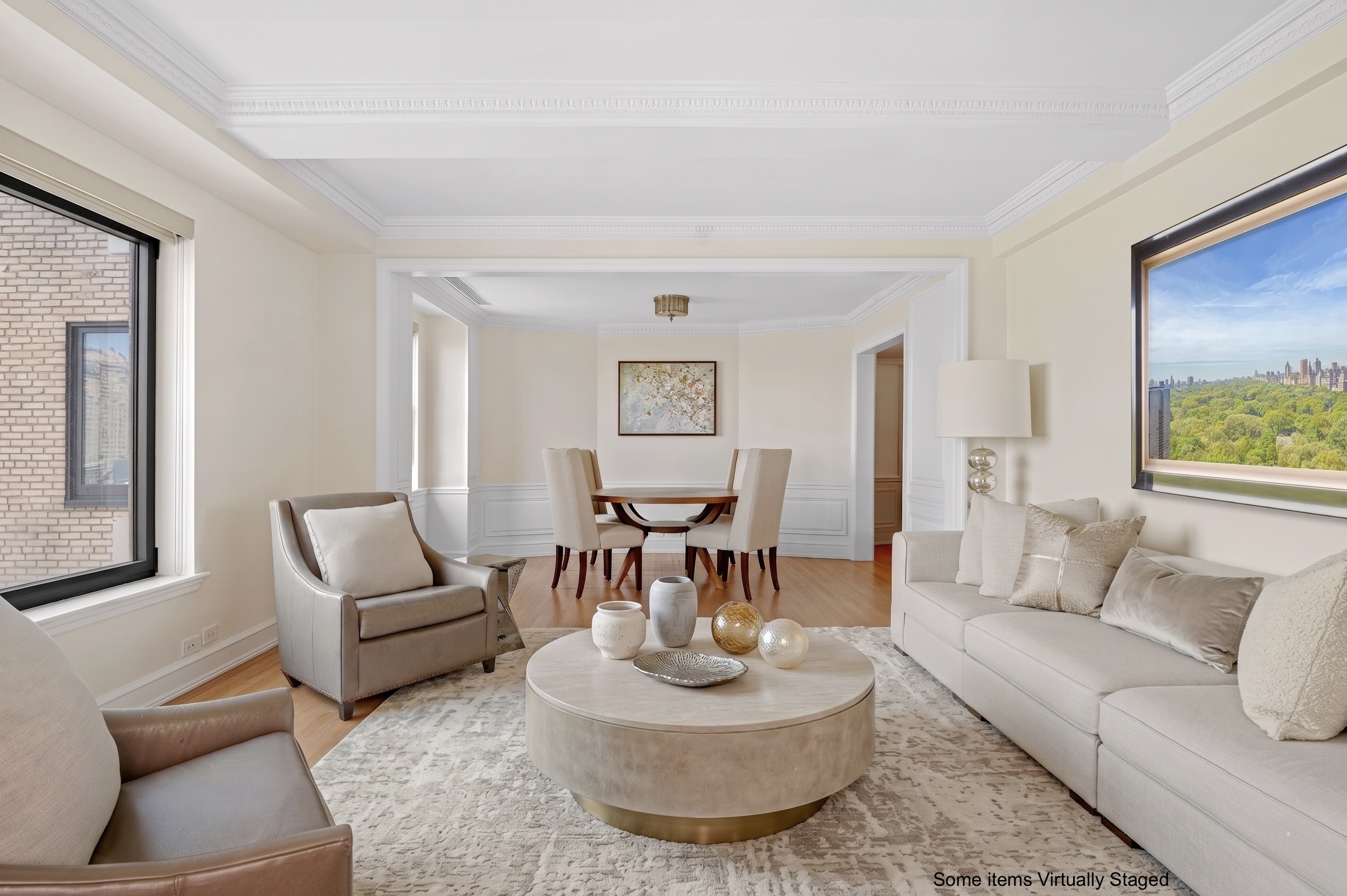 160 Central Park South, Unit 2307 Manhattan, NY 10019 - Photo 2 of 15 a living room with furniture and a large window