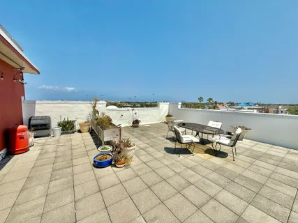 a view of a street with cars on the road