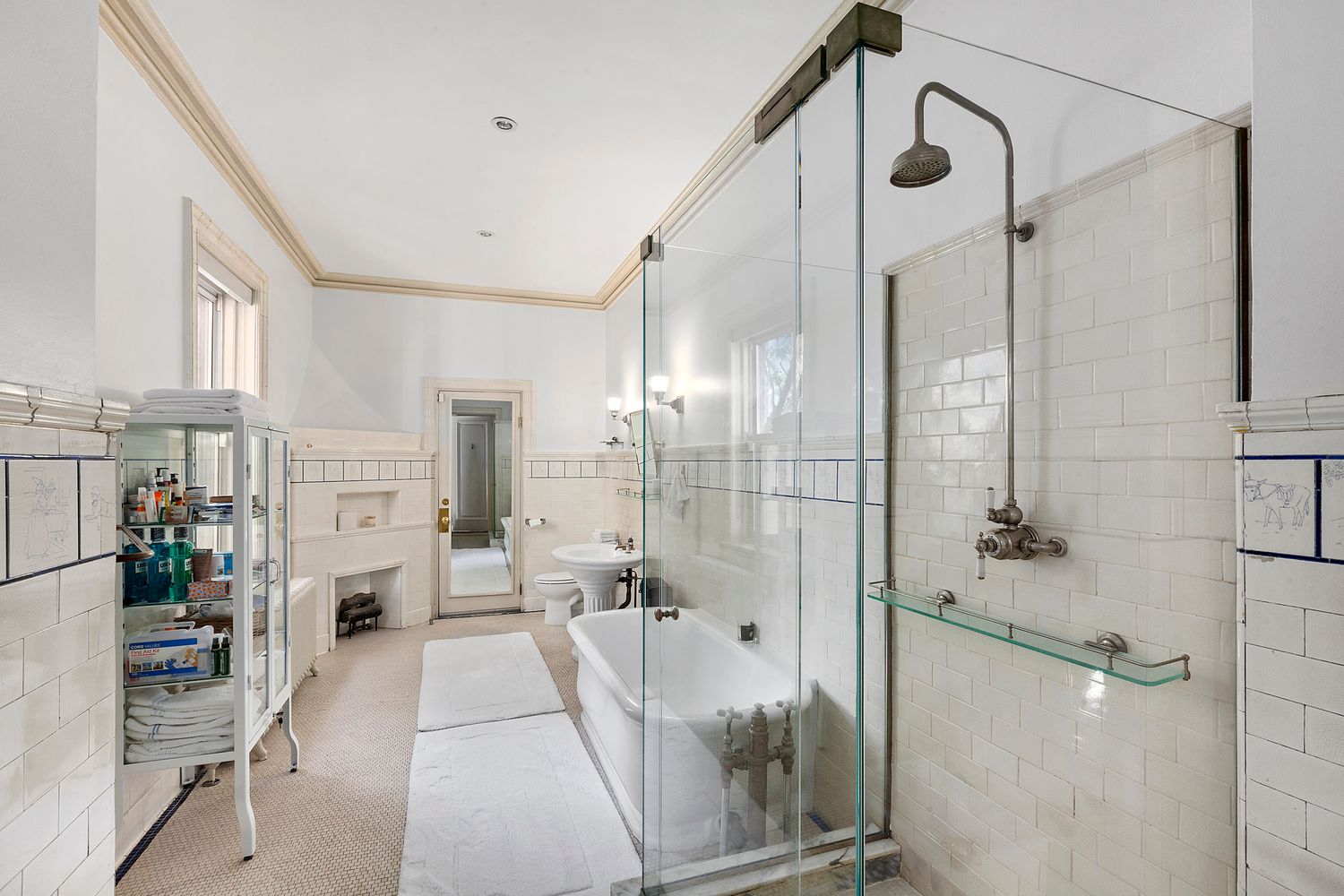 16 East 74th Street, Unit 4/5 Manhattan, NY 10021 - Photo 6 of 13 a bathroom with a tub and a shower