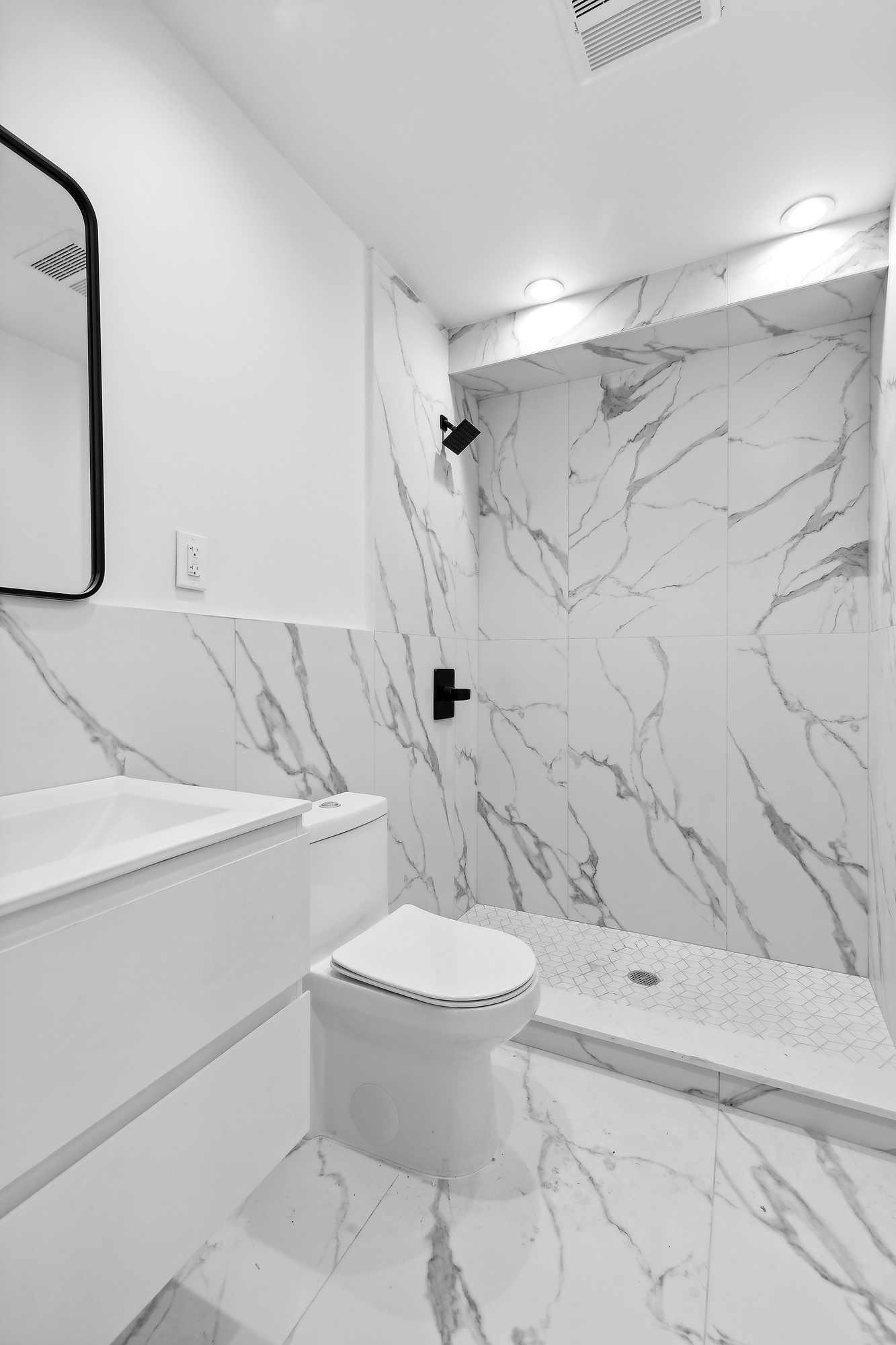 116 Madison Street Brooklyn, NY 11216 - Photo 8 of 20 a bathroom with a sink toilet and shower