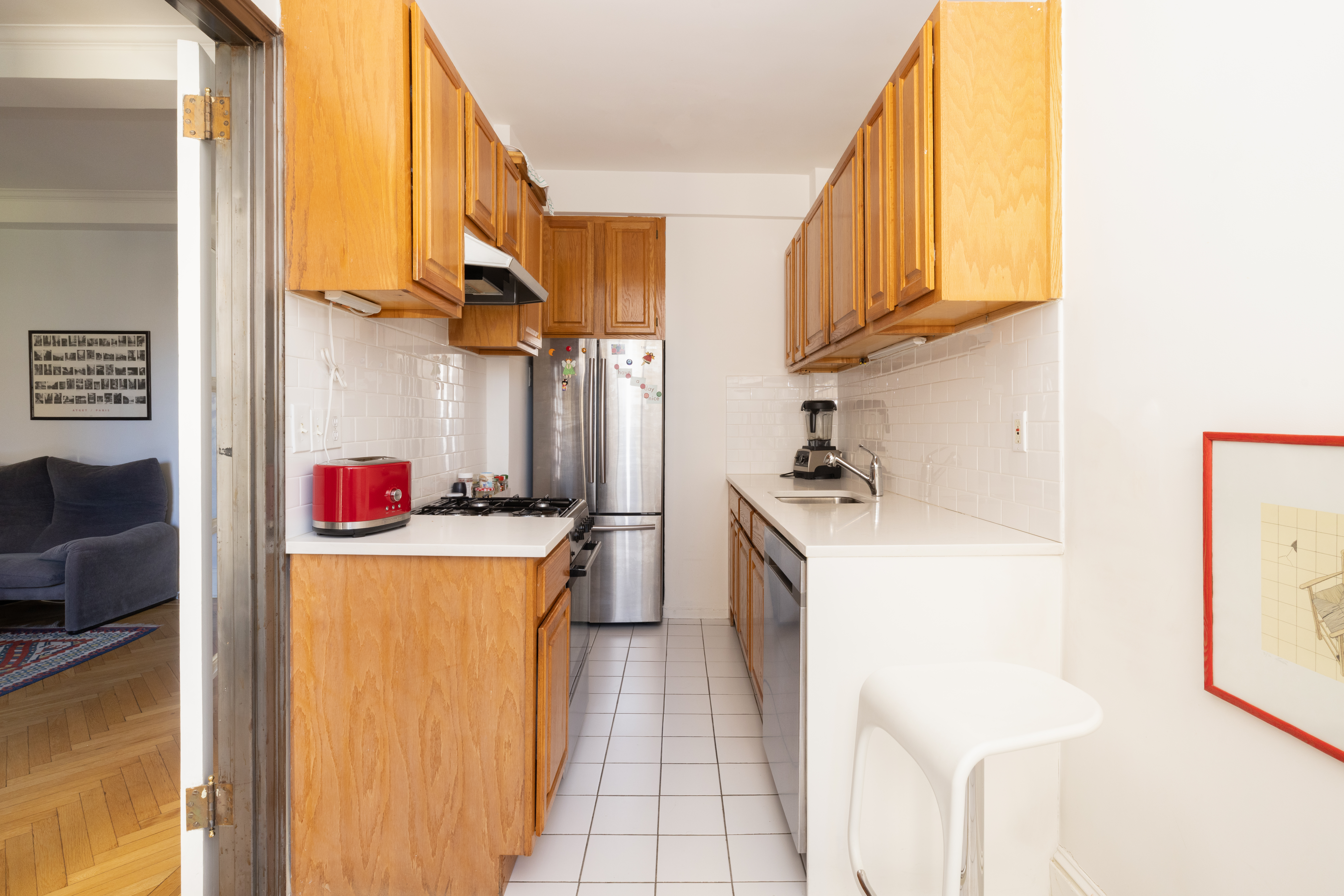 124 West 93rd Street, Unit 6E Manhattan, NY 10025 - Photo 5 of 9 a utility room with dryer and washer