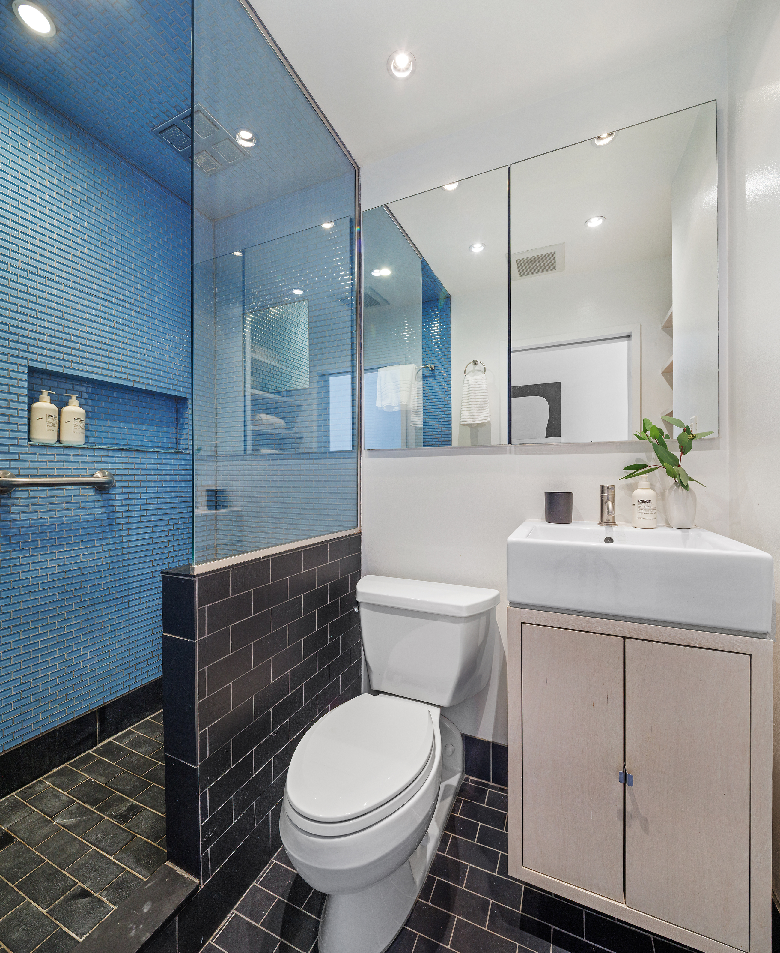 350 West 14th Street, Unit 6D Manhattan, NY 10014 - Photo 12 of 16 a bathroom with a sink toilet and shower