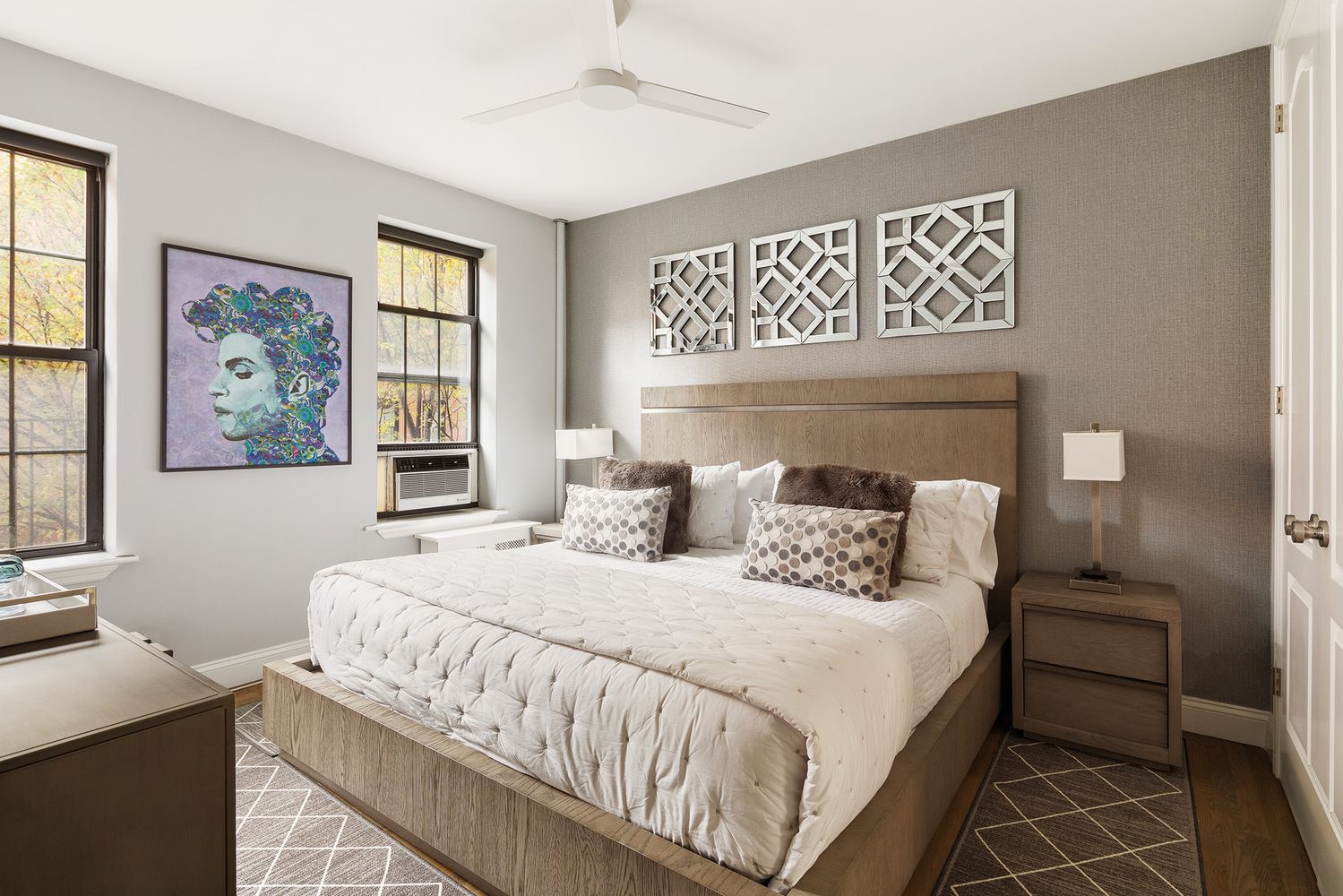 a bedroom with a bed and a table