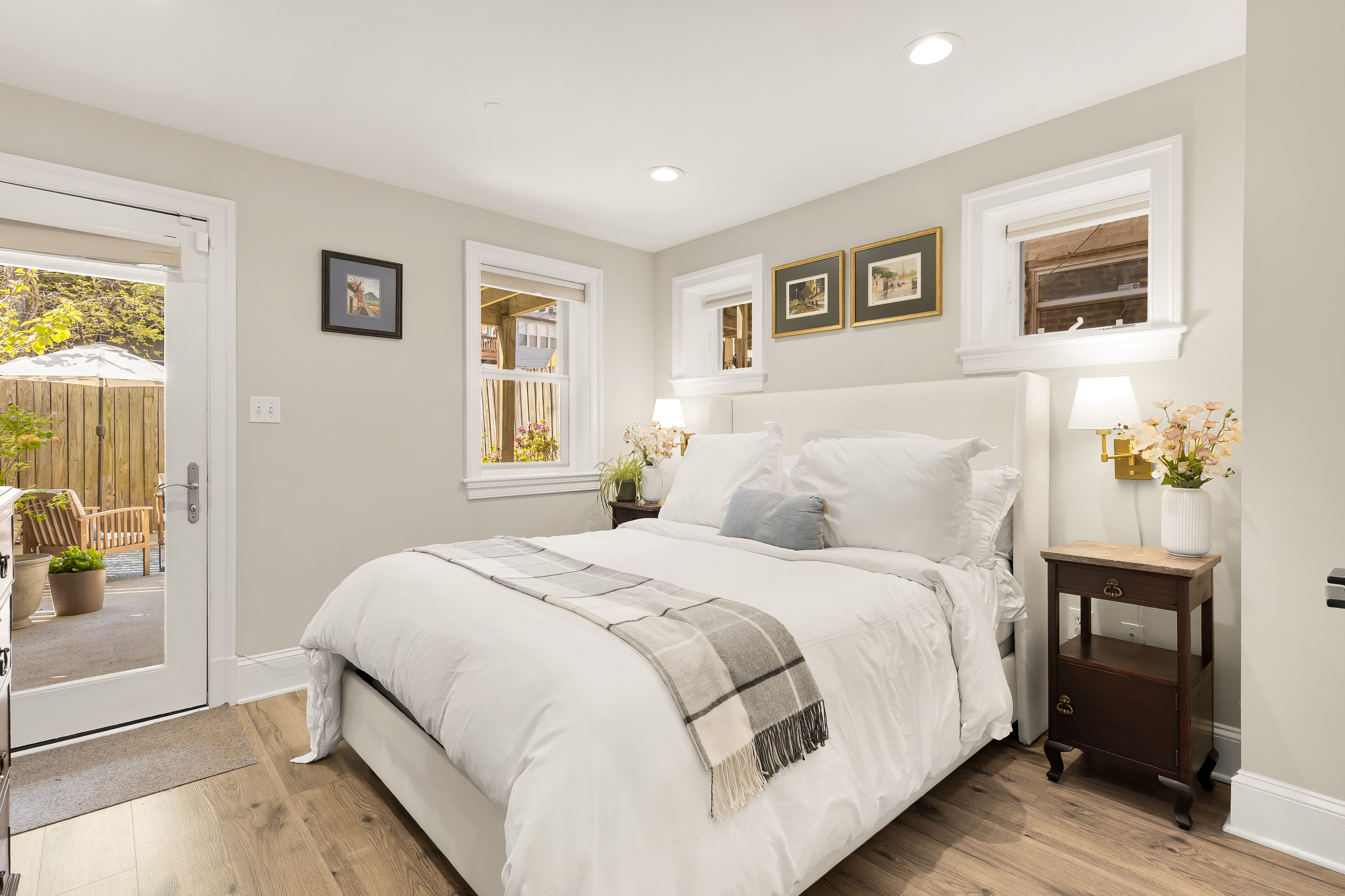 1354 Kenyon Street Northwest, Unit G Washington, DC 20010 - Photo 26 of 35 a bedroom with a large bed and a window