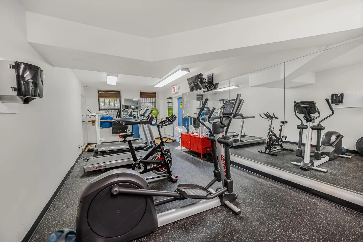 a view of a room with gym equipment