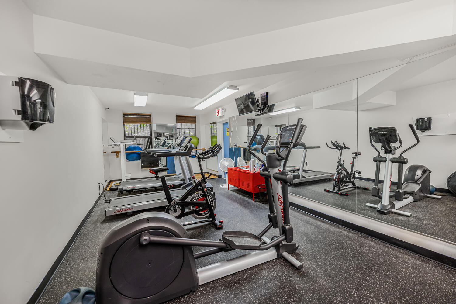 4 West 109th Street, Unit 4F Manhattan, NY 10025 - Photo 13 of 16 a view of a room with gym equipment